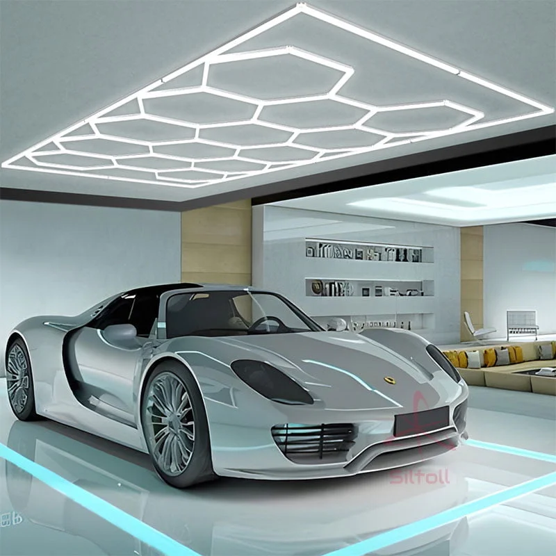 Stylish hexagon LED garage lights illuminating a modern home car detailing setup with luxury sports car